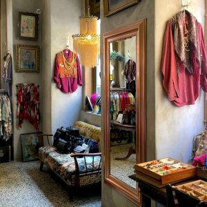 Vintage shop with second hand clothes in the city centre of Lisbon in the Baixa district