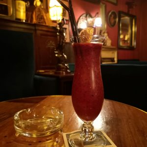 A Parodia cocktail bar in Lisbon, an old school speakeasy entirely decorated with creations by Rafael Bordalo Pinheiro