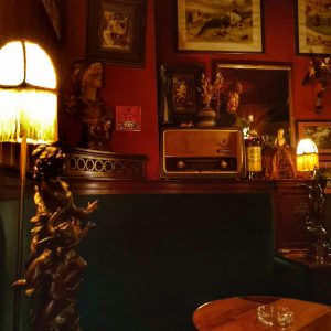 A Parodia cocktail bar in Lisbon, an old school speakeasy entirely decorated with creations by Rafael Bordalo Pinheiro