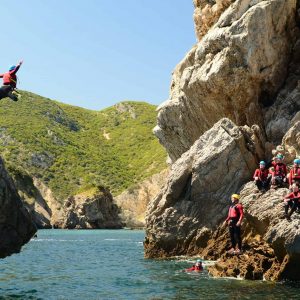team-building activity during your company seminar in Lisbon coasteering