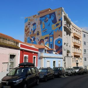 Colourful work in Graça by Aka Corleone, street art artist in Lisbon