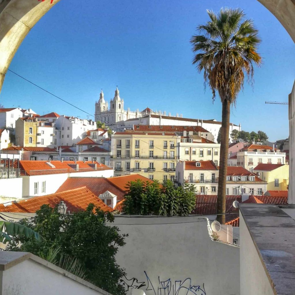Arch of Portas do Sol with views of Alfama and the Monastery of Saint Vincent outside the walls, a famous viewpoint to observe the Alfama district