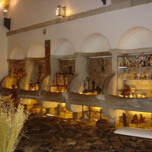 Objects, traditional souvenirs and creations of Portuguese craftsmen in a shop in Alfama near Lisbon Cathedral