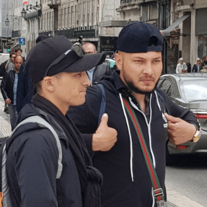 Two young pickpockets in Lisbon in observation mode in the Baixa district
