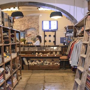 Shop in Alfama selling accessories and clothing made of high quality Portuguese wool from the Estrela mountain