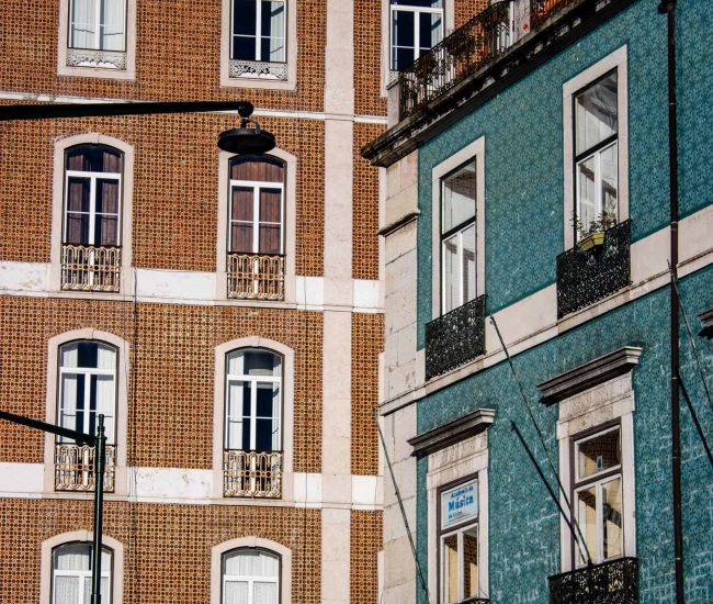 Typical Lisbon buildings covered with tiles called azulejos in the Graça district