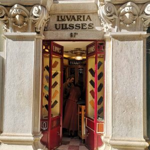 Historic Ulisses shop in Lisbon's Chiado district, offering elegant leather gloves made in Portugal