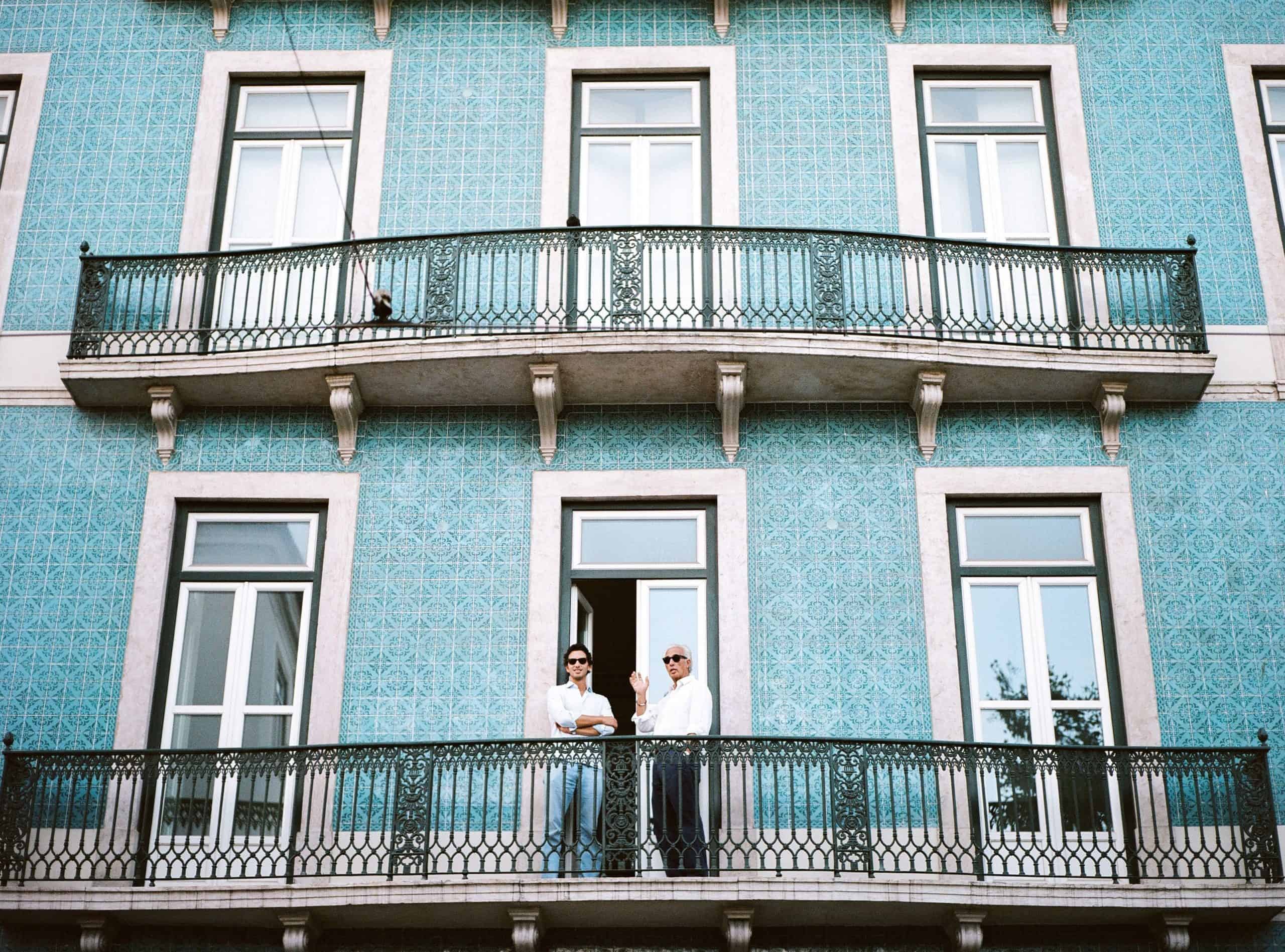 Investors in a typical Lisbon house covered with tiles. There are many investment opportunities in Lisbon