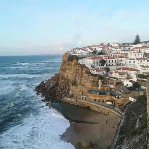 Wild coast of Sintra near Lisbon with the beautiful village of Azenhas do mar