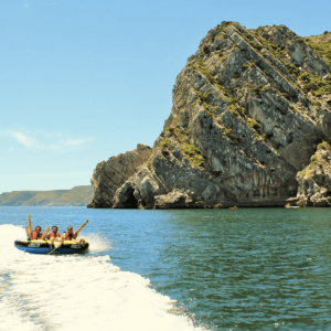 Fun in Lisbon with a trip on a water tube with friends, colleagues during a hen stag party or a corporate team building