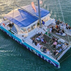 Party on the Tagus aboard a festive catamaran for a sunset hen or stag party in Lisbon